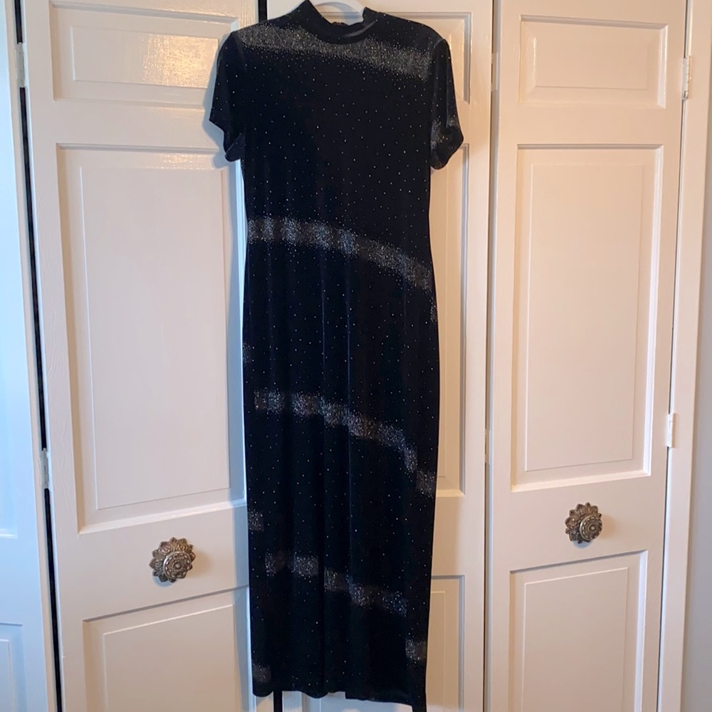 Ladies Black velvet gown with silver sparkles. Dress is 19 inches wide.